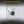 Smart lock on a glass door with smartphone display, featuring text about multi-purpose glass door adsorption.